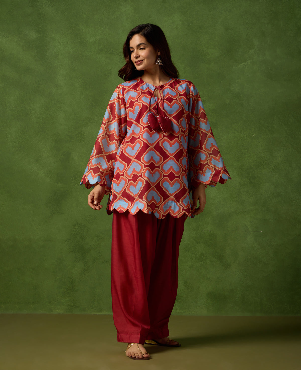 Roli Short Kurta with Flared Sleeves and Flowy Farshi Salwar - Rare Threads by Naina