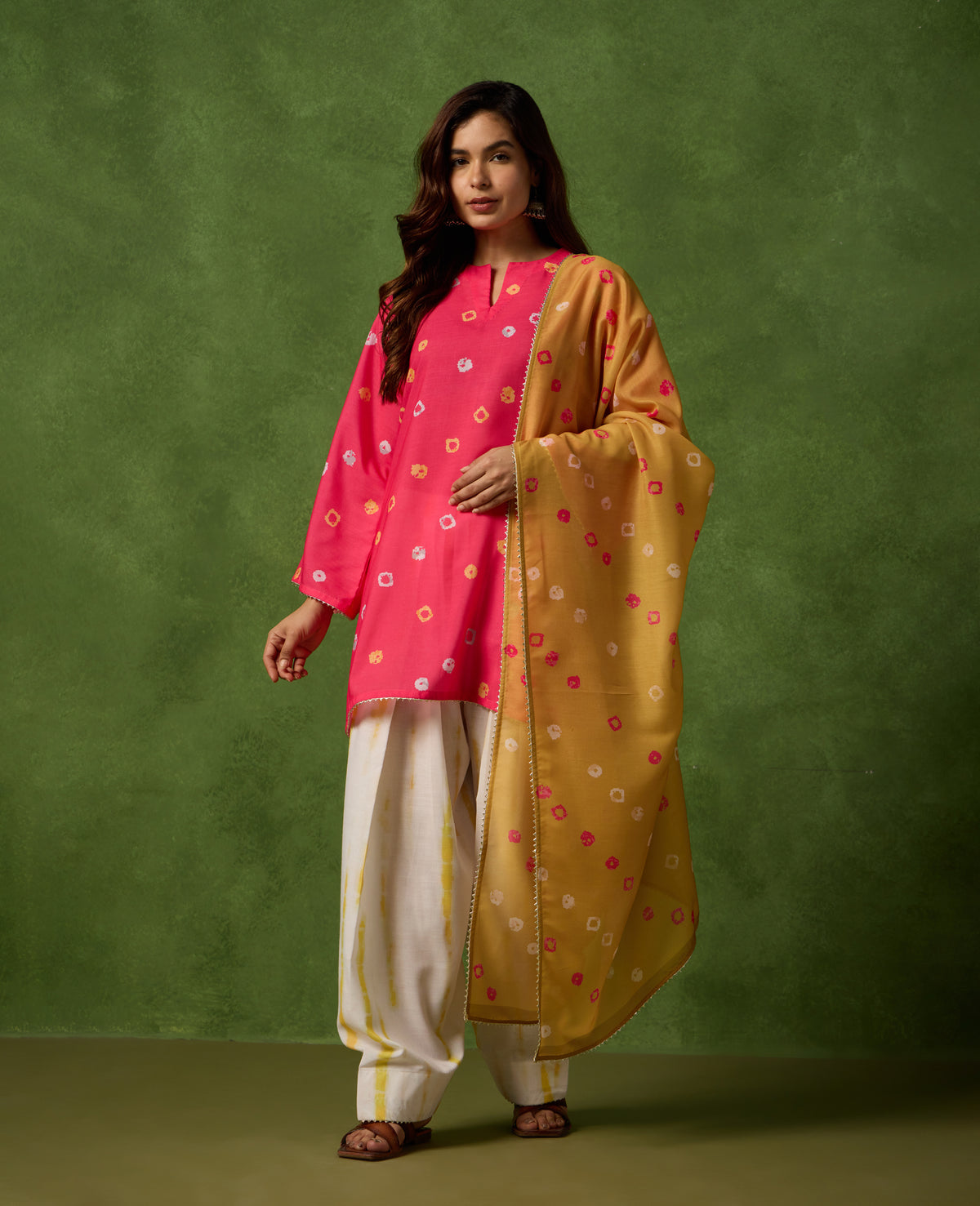 Taara Bright Pink Bandhani Short Kurti & White Salwar Set